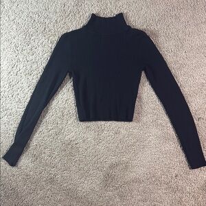 Chic Black Ribbed Turtleneck Top